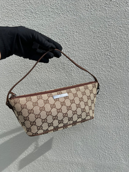 Pre-loved Gucci vintage GG Canvas Boat Baguette Bag Brown