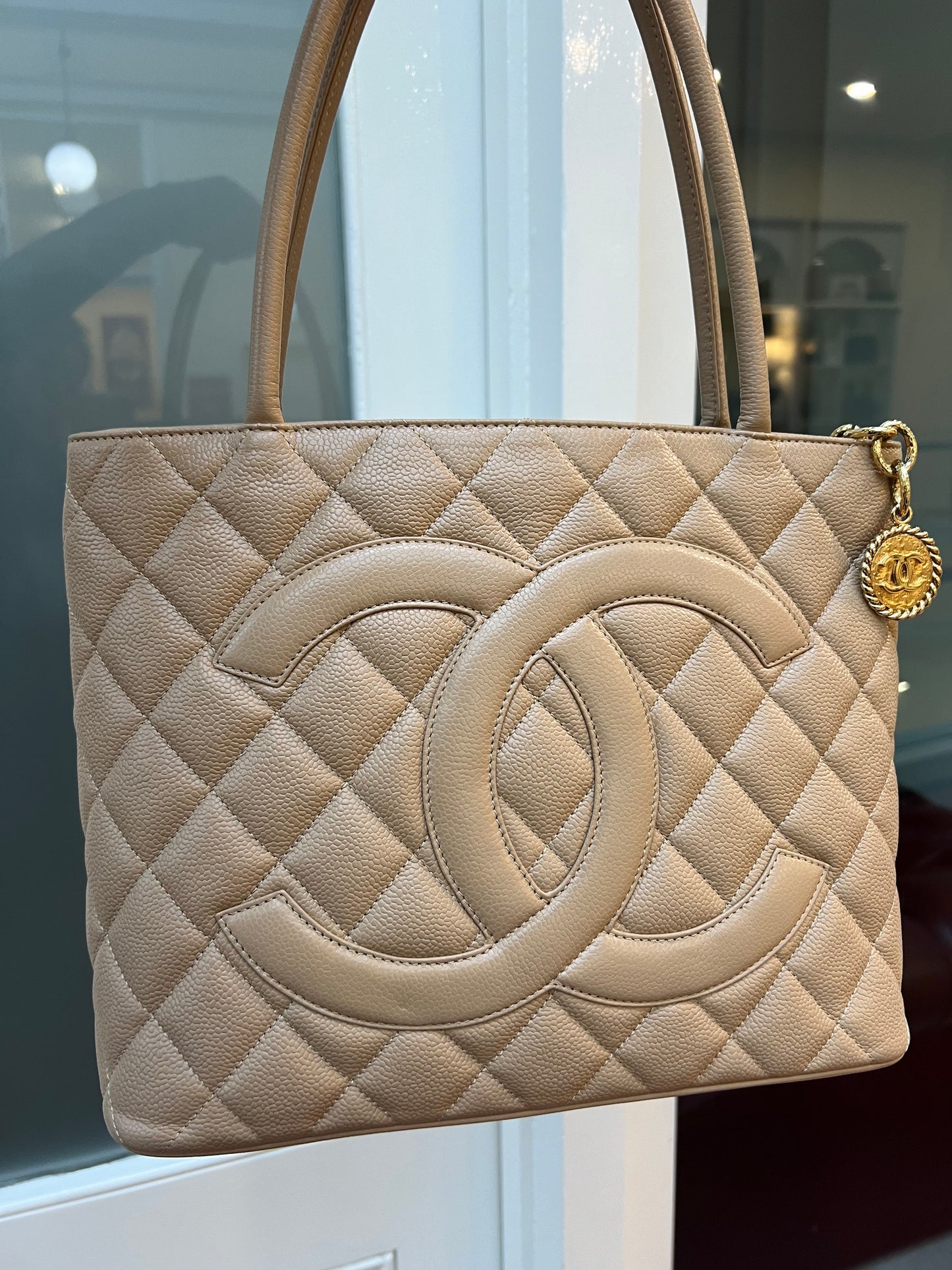 Pre-loved Chanel Caviar Medalion Tote Beige