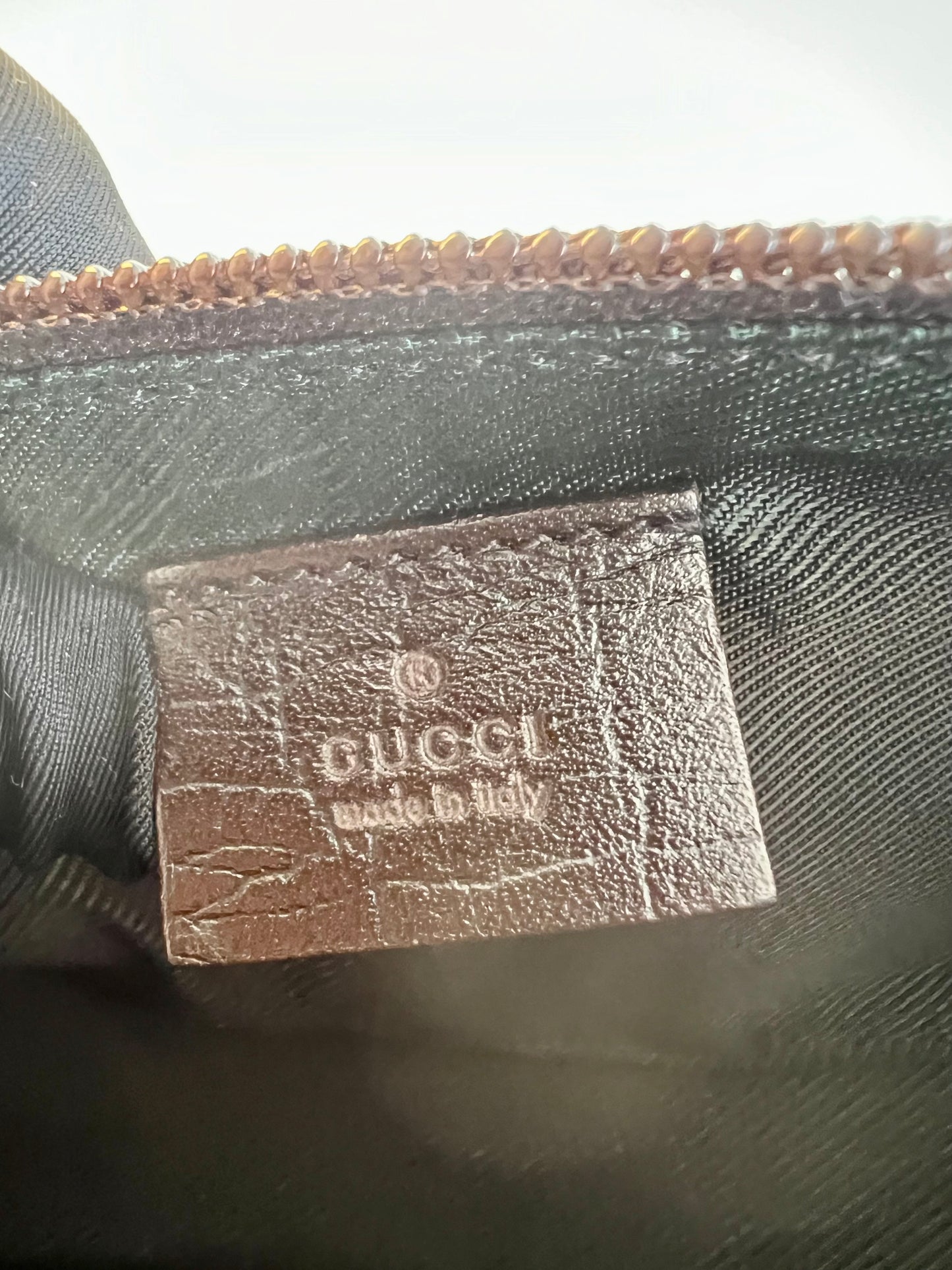 Pre-loved Gucci vintage GG Canvas Boat Baguette Bag Brown
