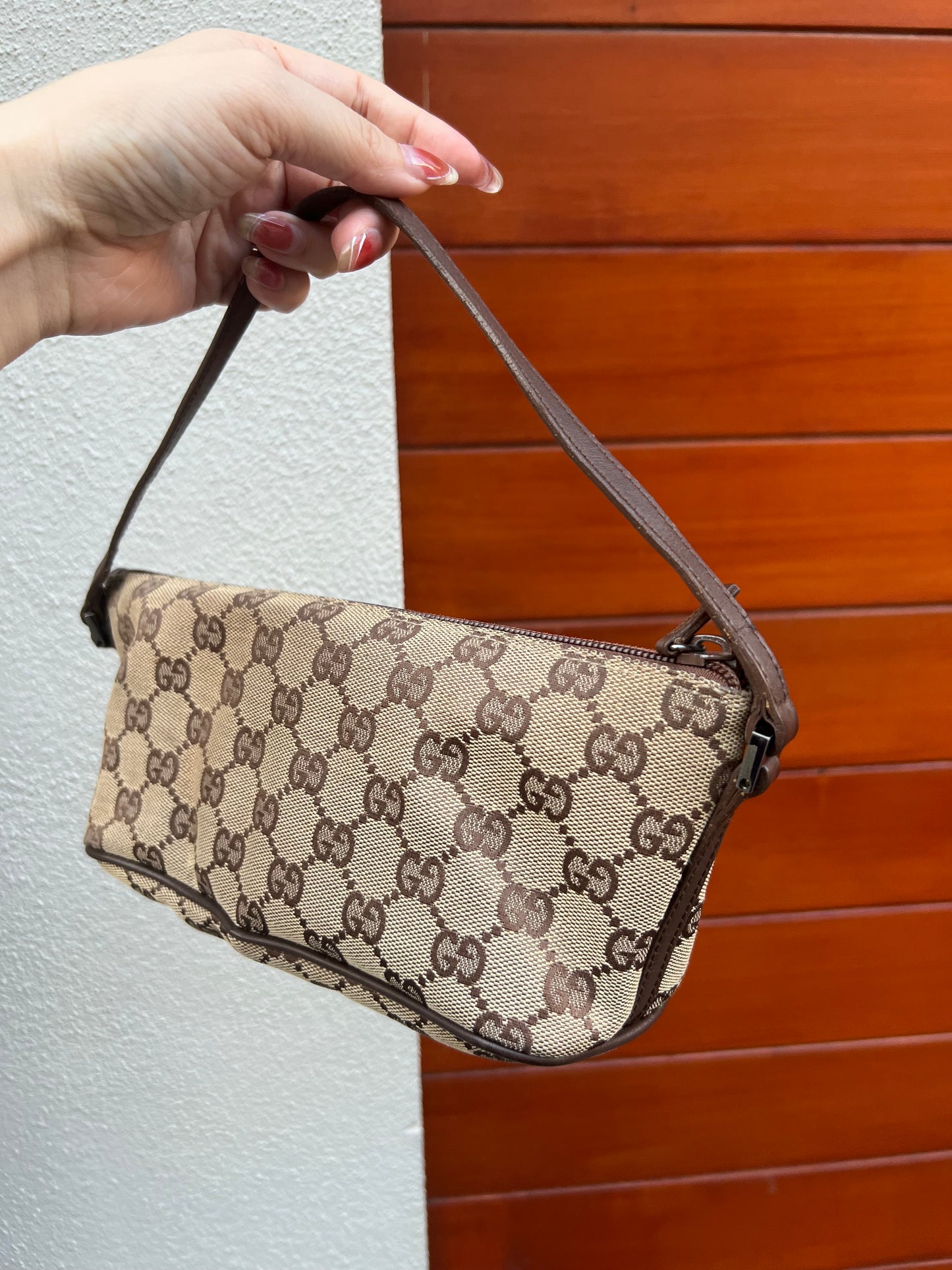 Pre-loved Gucci vintage GG Canvas Boat Baguette Bag Brown