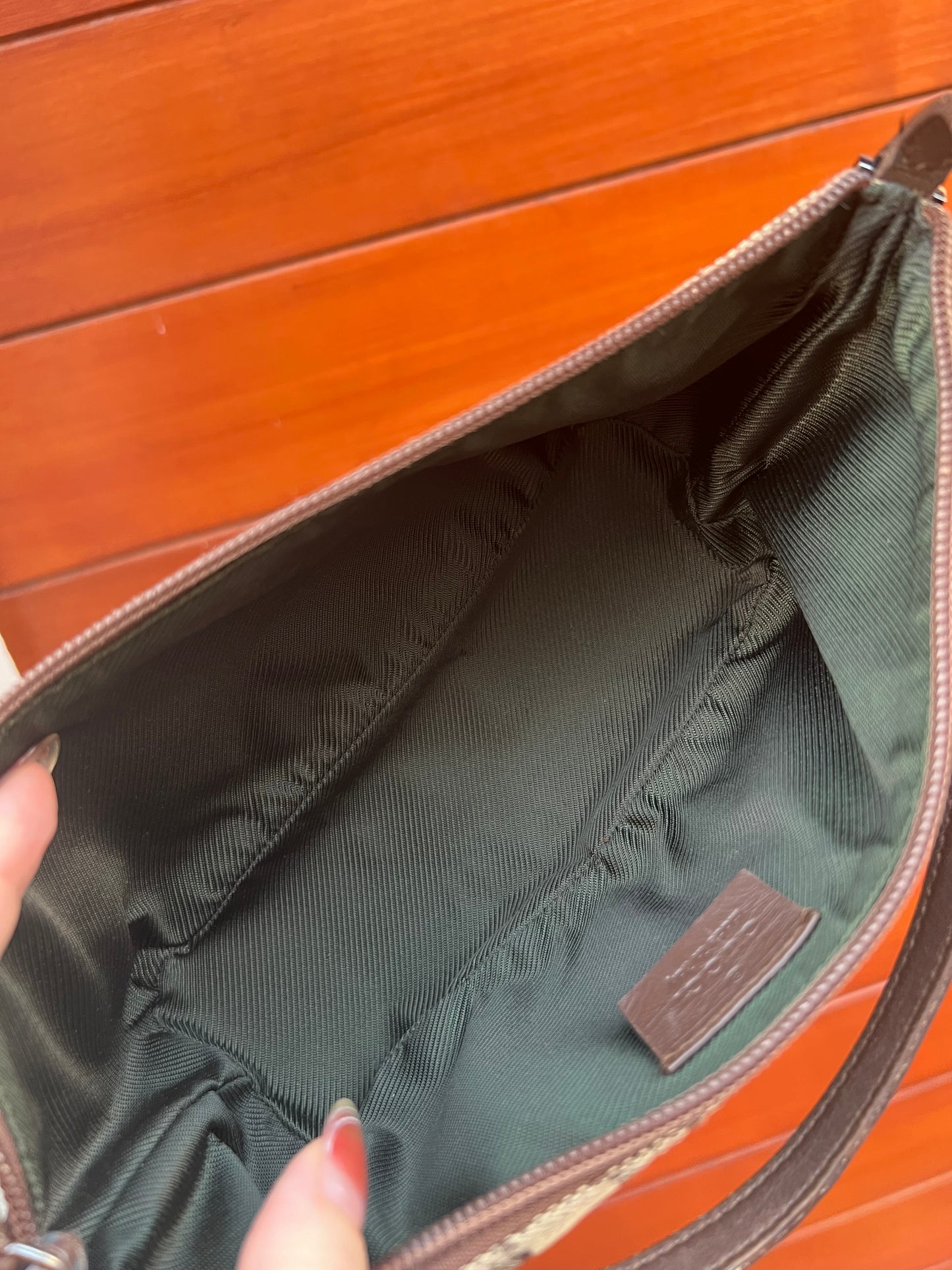Pre-loved Gucci vintage GG Canvas Boat Baguette Bag Brown