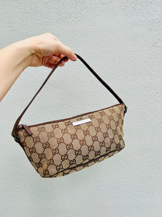 Pre-loved Gucci vintage GG Canvas Boat Baguette Bag Brown