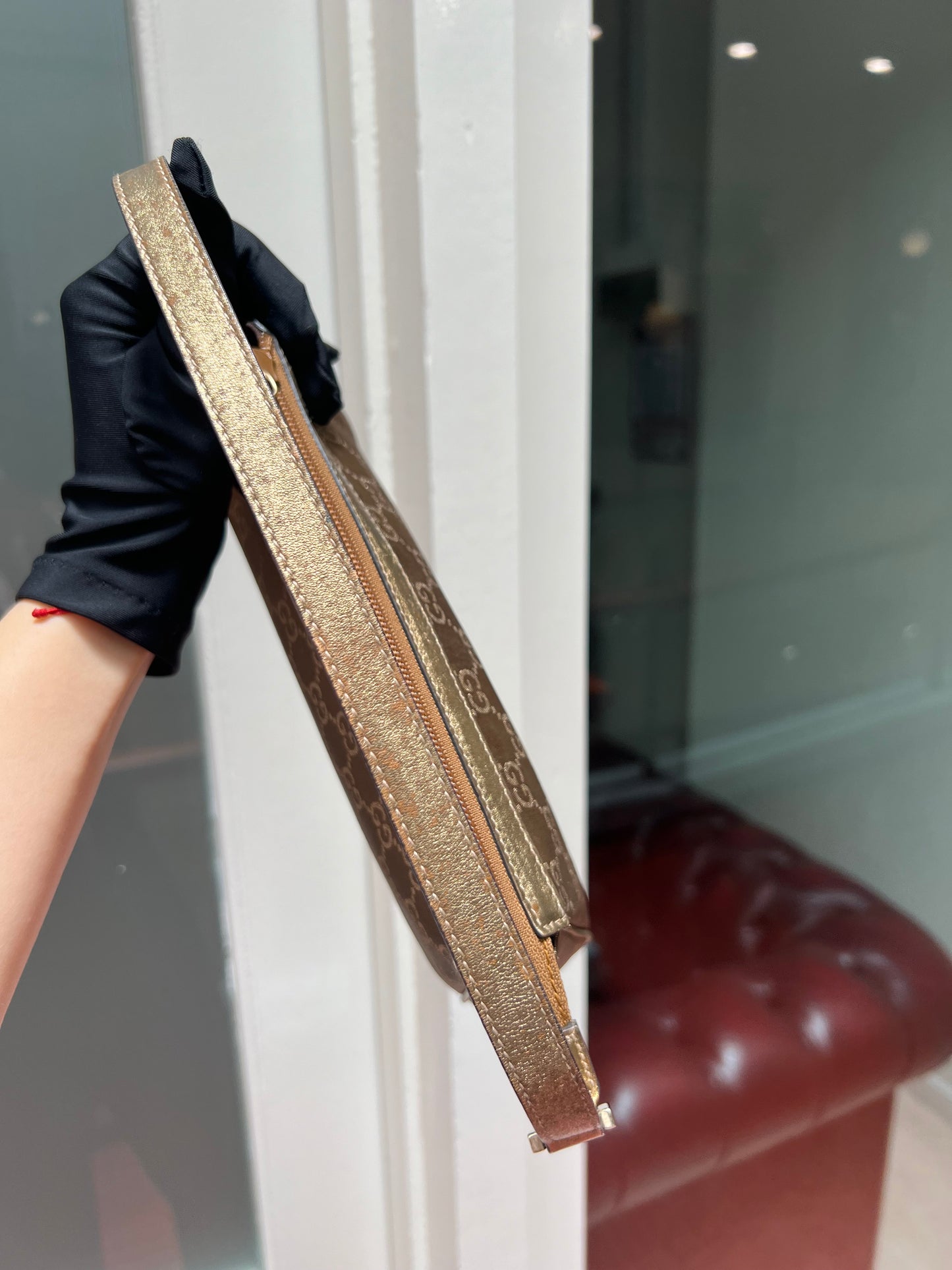 Pre-loved Gucci Monogram Pochette Bag