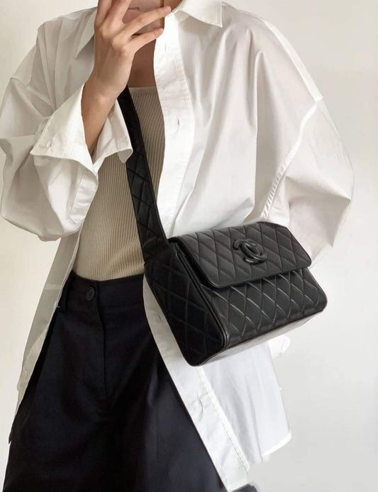 Pre- loved Chanel Black Quilted Lambskin Vintage Medium Leather Logo Flap Bag