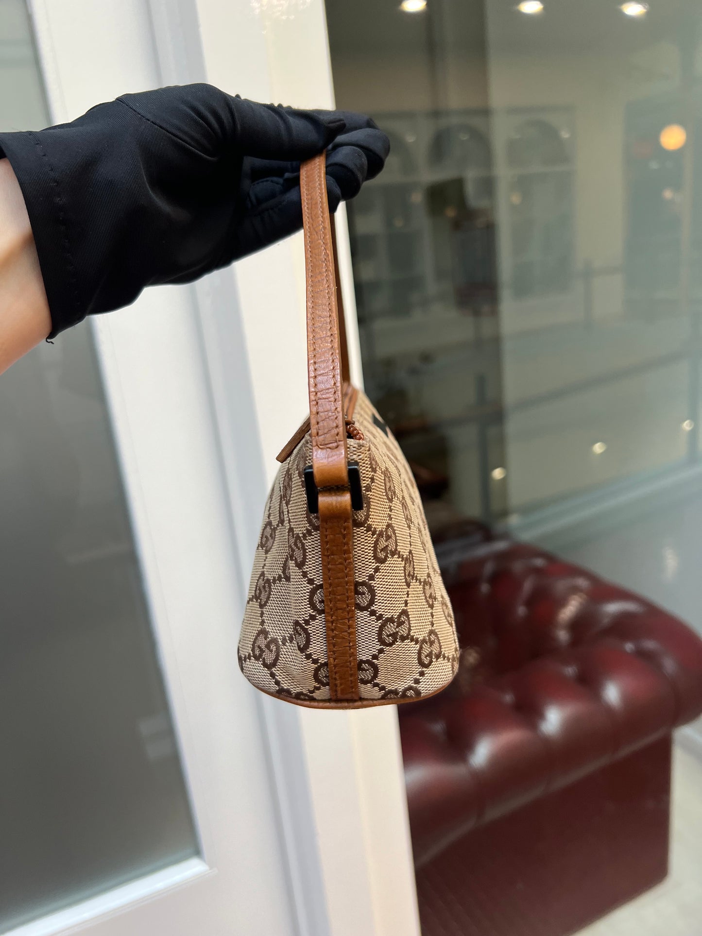 Pre-loved Gucci vintage GG Canvas Boat Baguette Bag Brown