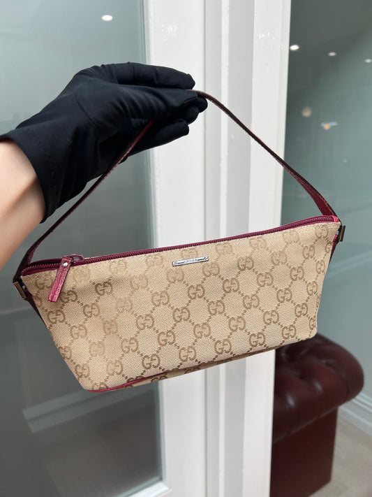 Pre-loved Gucci vintage GG Canvas Boat Baguette Bag Brown