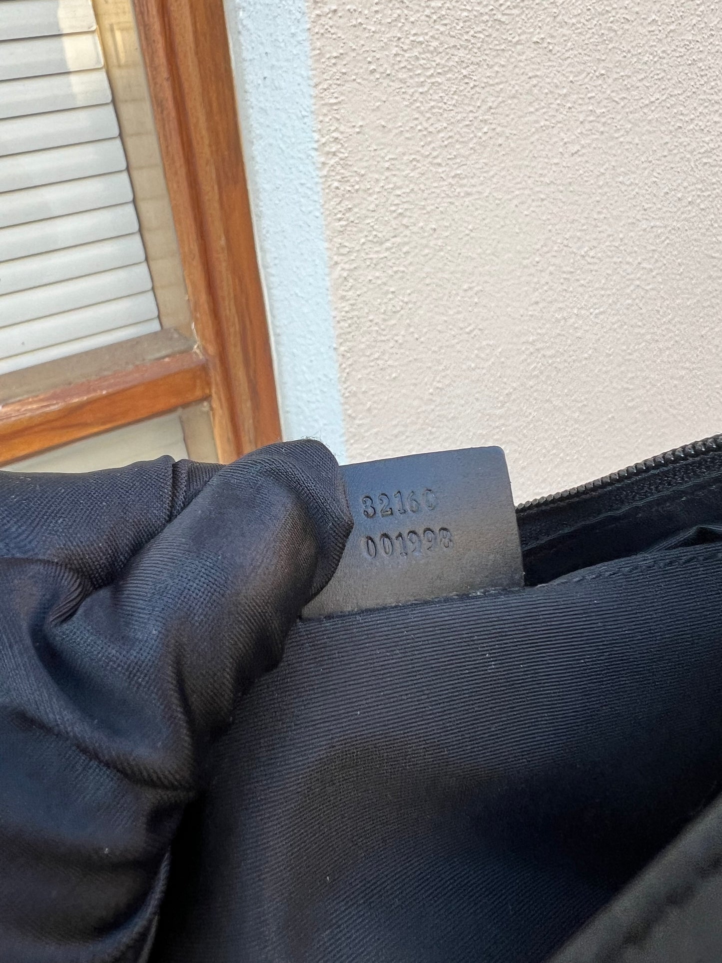 Pre-loved Gucci monogram bag in denim with gold toned hardware. Circa 2000s.