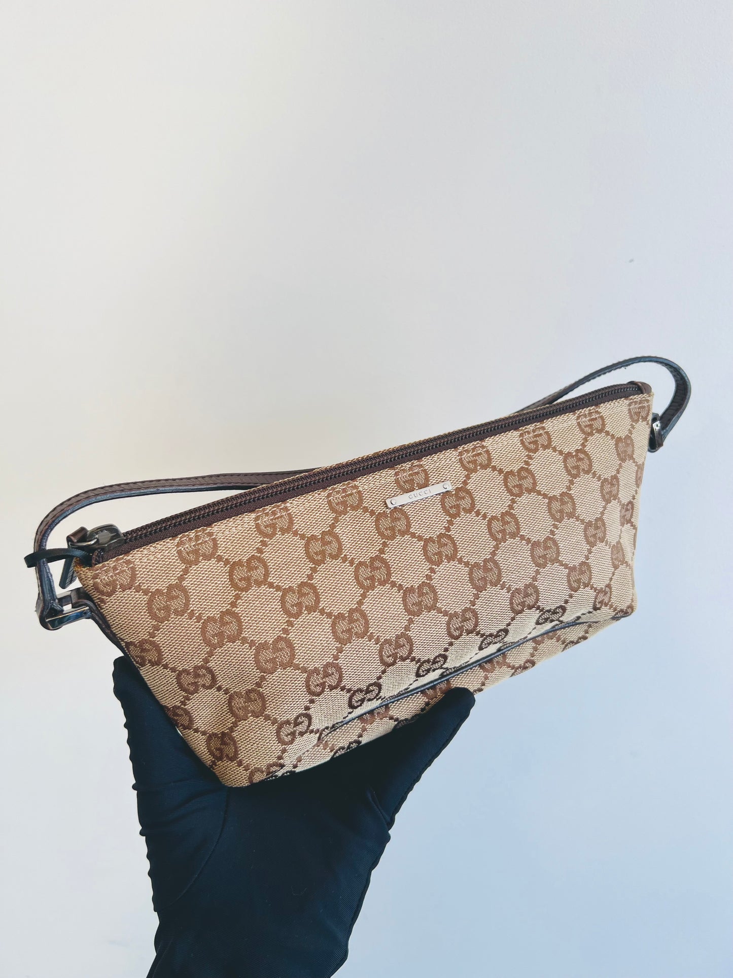 Pre-loved Gucci vintage GG Canvas Boat Baguette Bag Brown