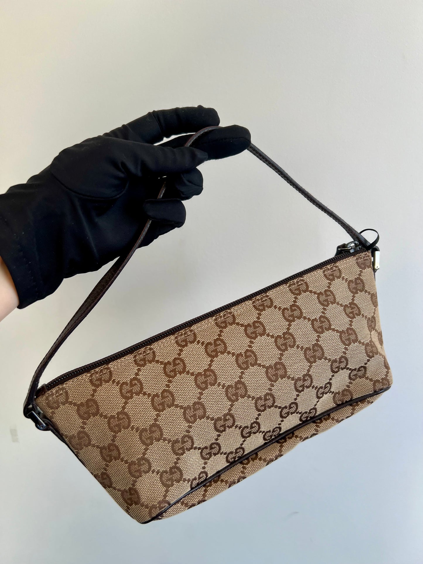 Pre-loved Gucci vintage GG Canvas Boat Baguette Bag Brown