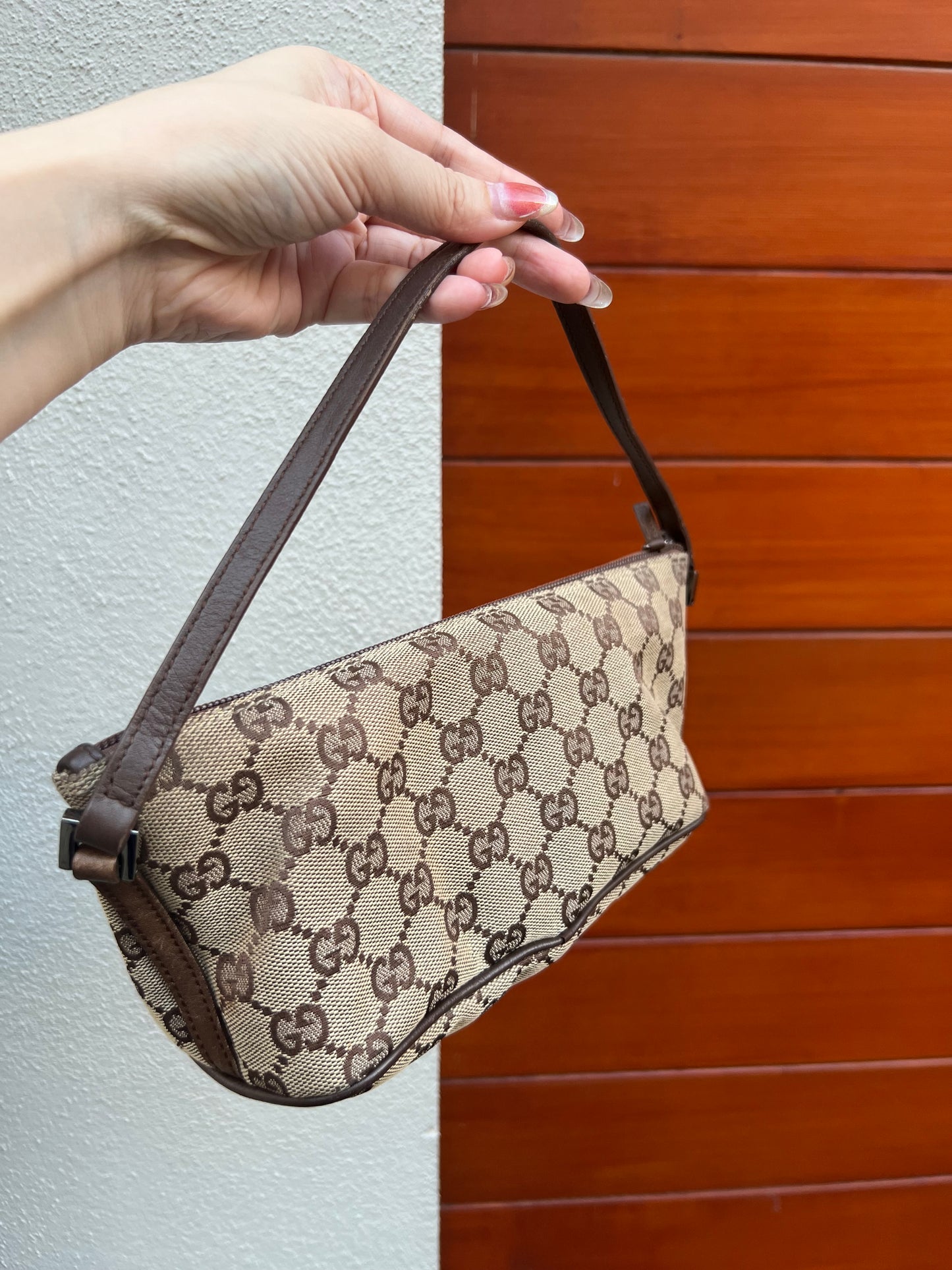 Pre-loved Gucci vintage GG Canvas Boat Baguette Bag Brown