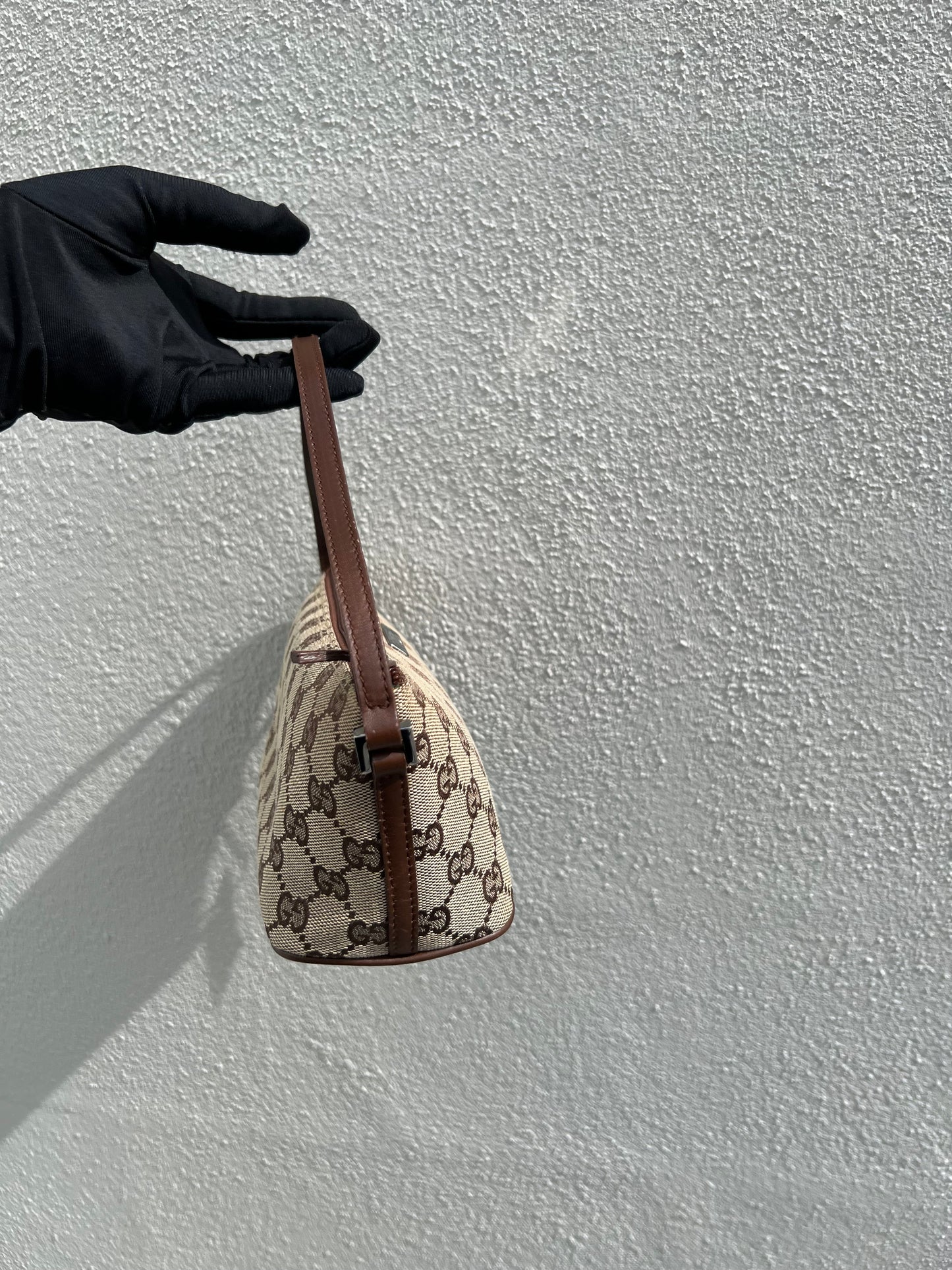 Pre-loved Gucci vintage GG Canvas Boat Baguette Bag Brown