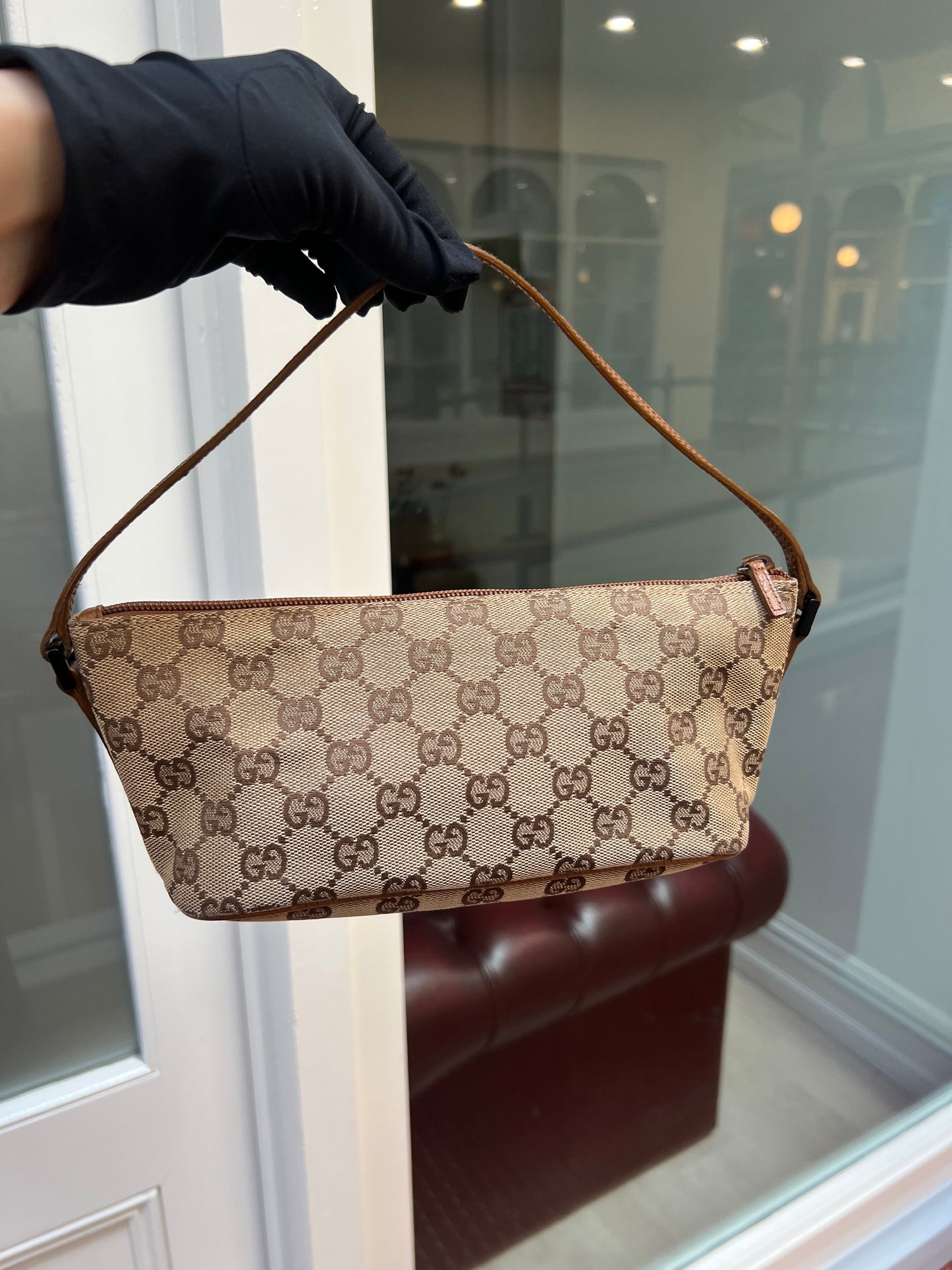 Pre-loved Gucci vintage GG Canvas Boat Baguette Bag Brown