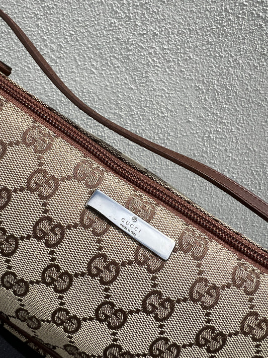 Pre-loved Gucci vintage GG Canvas Boat Baguette Bag Brown
