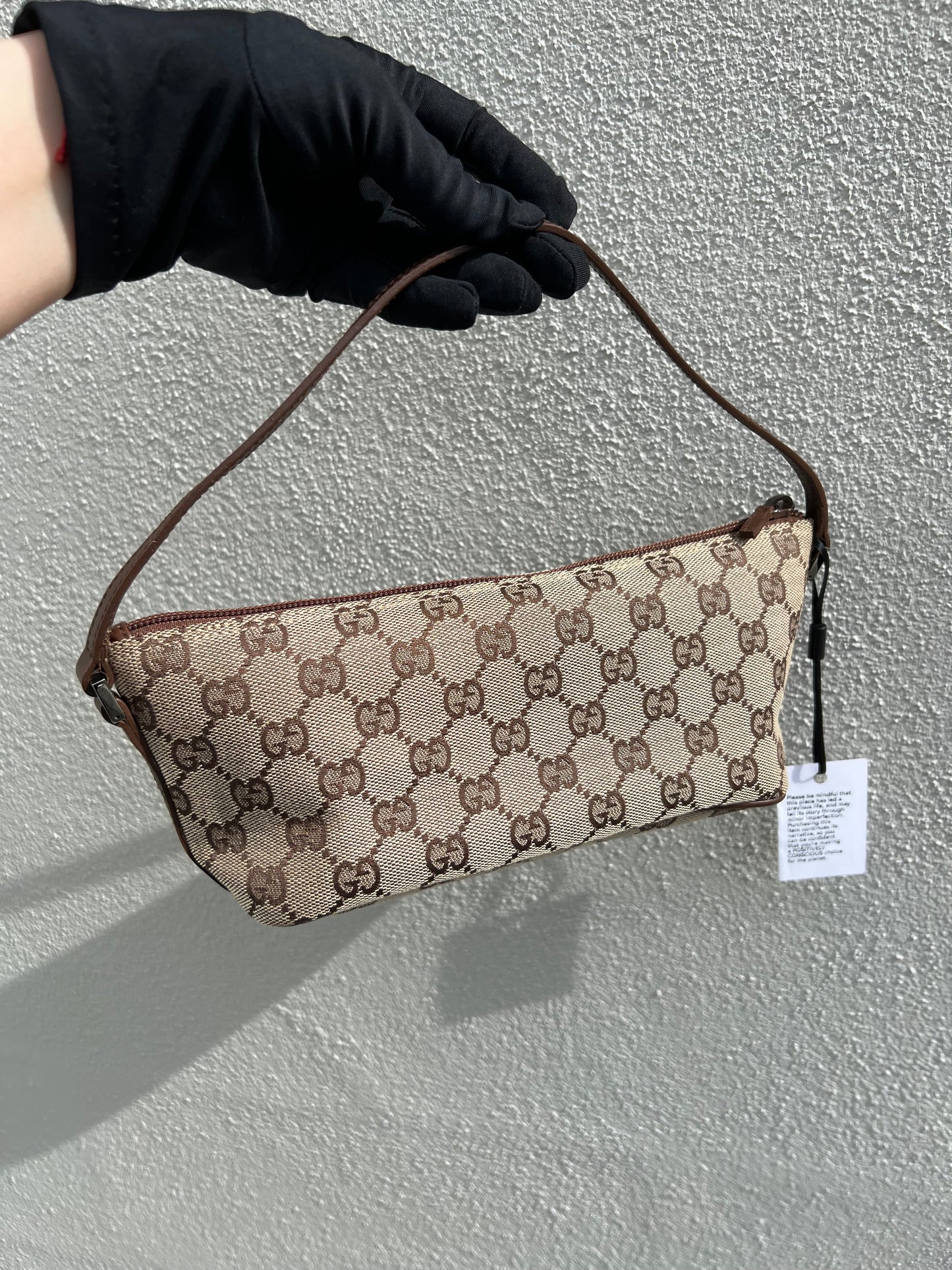 Pre-loved Gucci vintage GG Canvas Boat Baguette Bag Brown