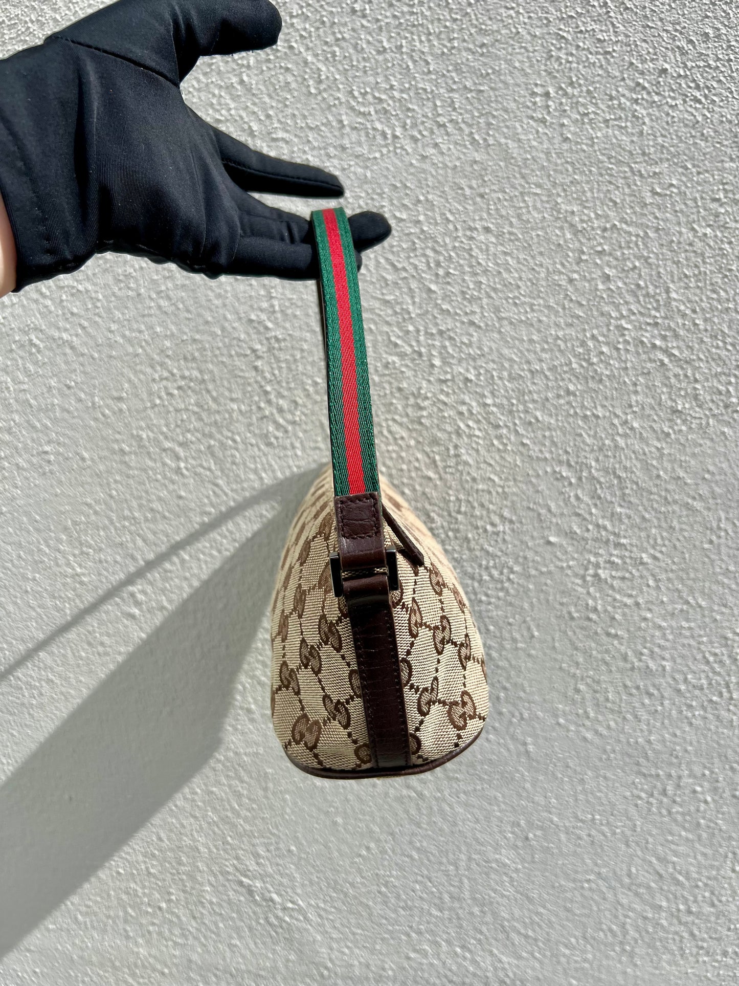 Pre-loved Gucci vintage GG Canvas Boat Baguette Bag