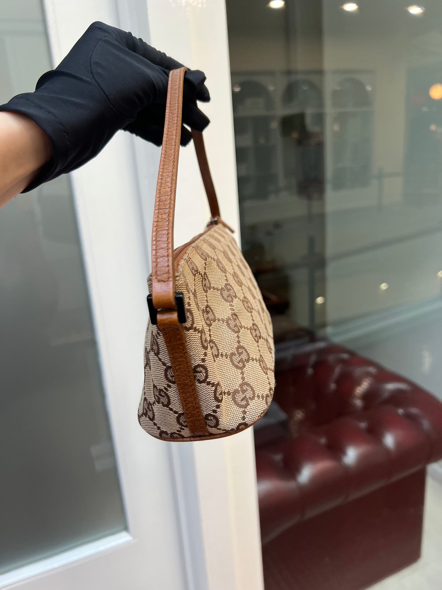 Pre-loved Gucci vintage GG Canvas Boat Baguette Bag Brown