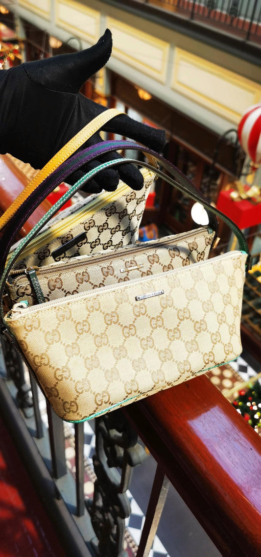 Pre-loved Gucci vintage GG Canvas Boat Baguette Bag