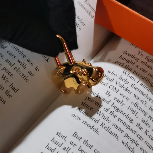 Pre-loved Hermès 2005 Annee Des Fleuves Permabrass Gold Hippopotamus Cadena Lock Charm