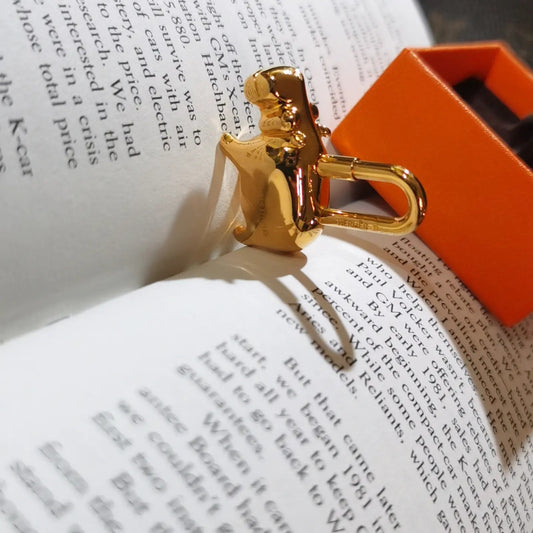 Pre-loved Hermès 2005 Annee Des Fleuves Permabrass Gold Hippopotamus Cadena Lock Charm