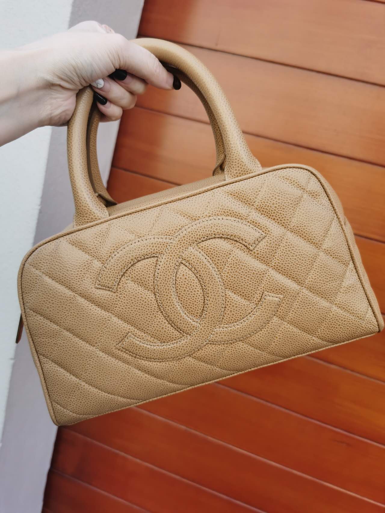 Pre-loved Chanel Vintage Beige Caviar Handbag