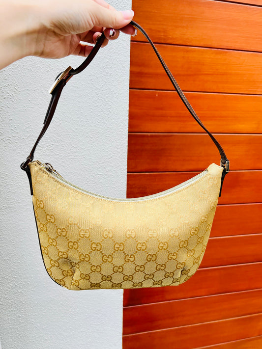 Pre-loved Gucci Vintage Light Gold Monogram Bag
