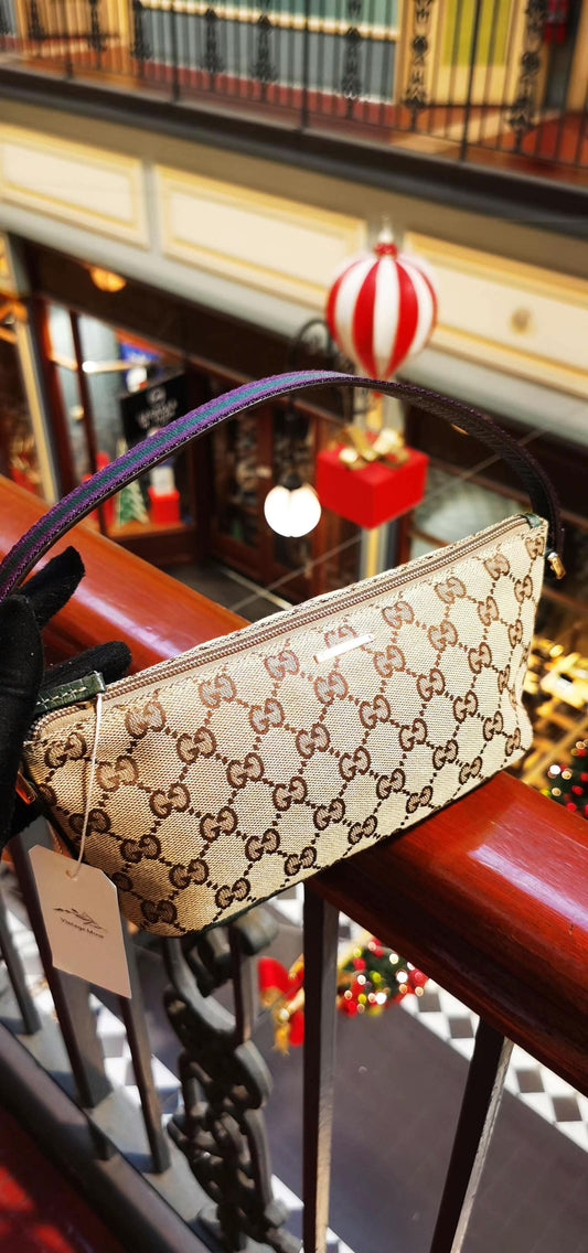 Pre-loved Gucci vintage GG Canvas Boat Baguette Bag