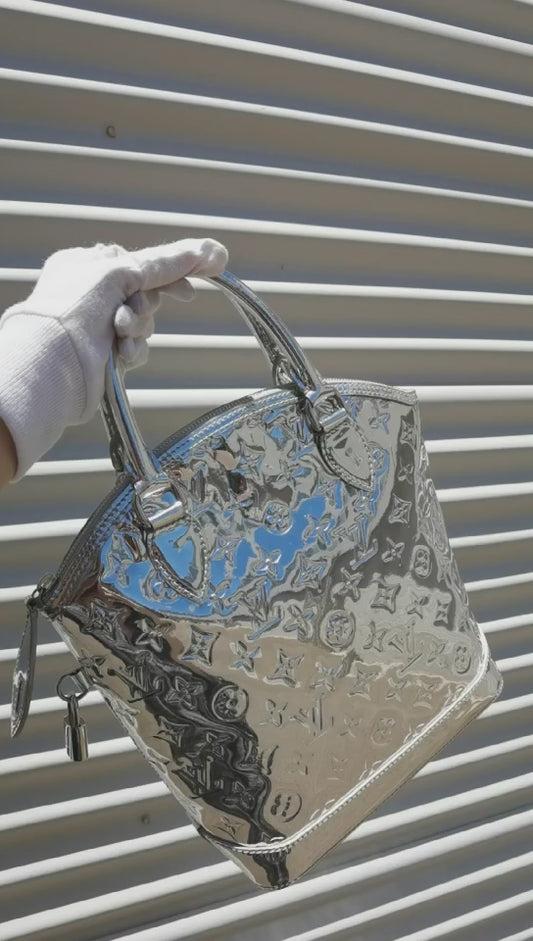 Pre-loved Louis Vuitton Limited Edition Silver Mirror Monogram Lockit Handbag