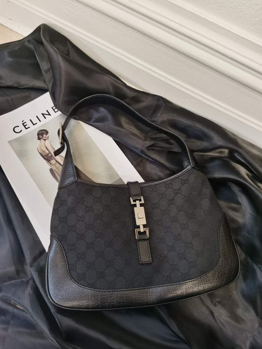 Pre-loved Gucci Vintage Monogram Jackie Bag