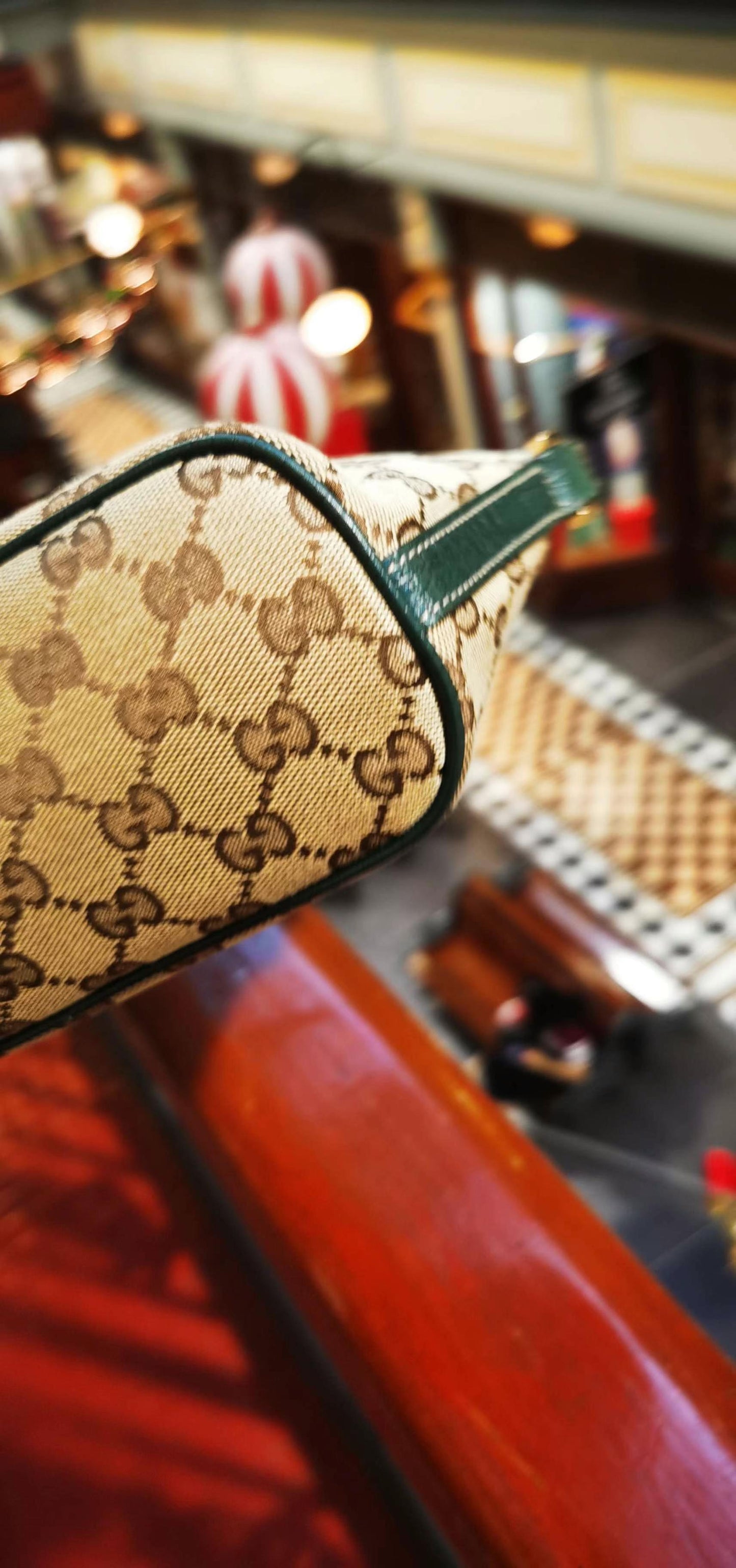 Pre-loved Gucci vintage GG Canvas Boat Baguette Bag
