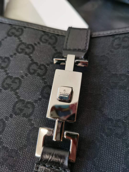 Pre-loved Gucci Vintage Monogram Jackie Bag