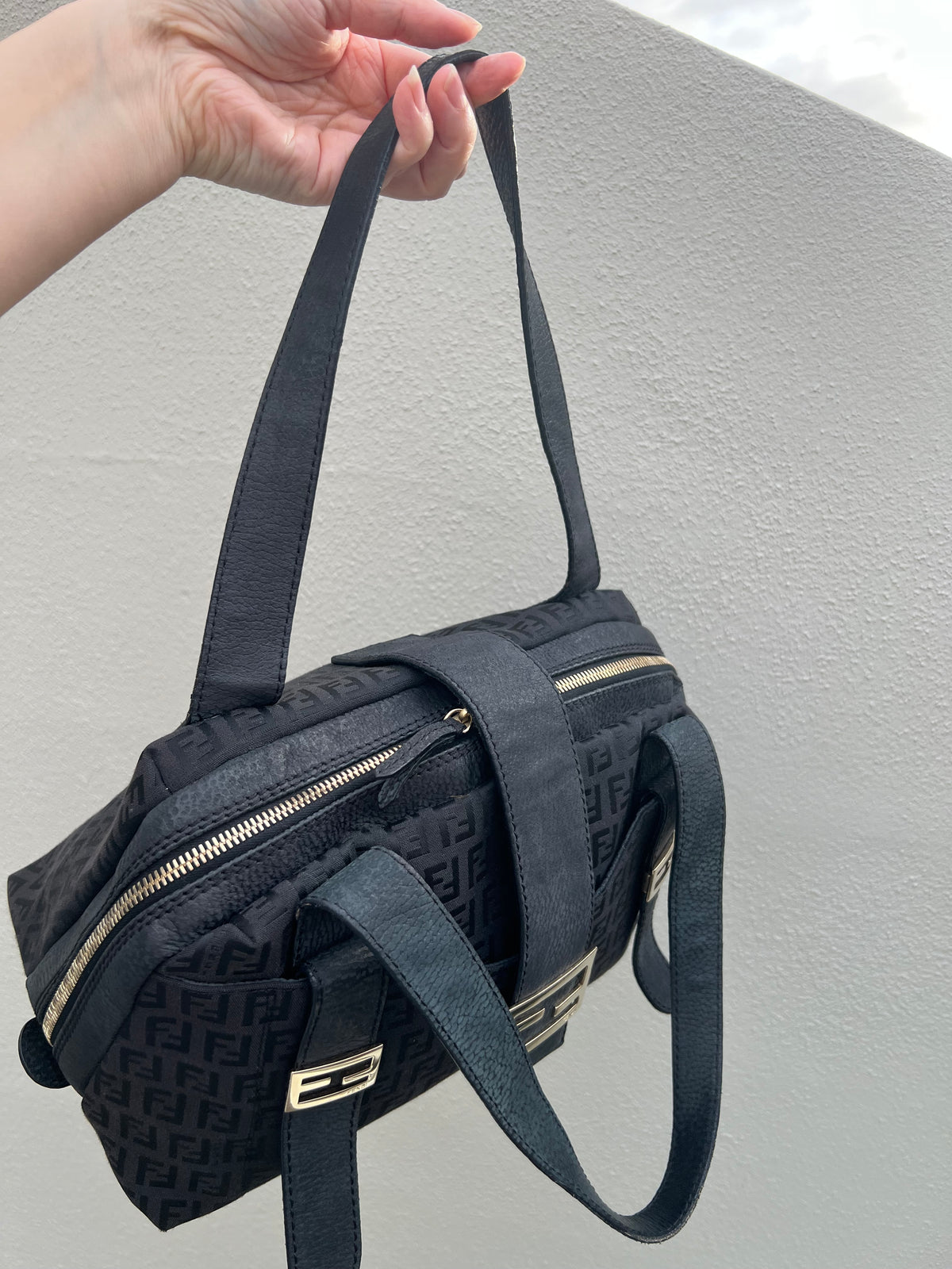Pre-loved Mulitclasps Black Canvas and Leather Fendi Baguette Shoulder Bag