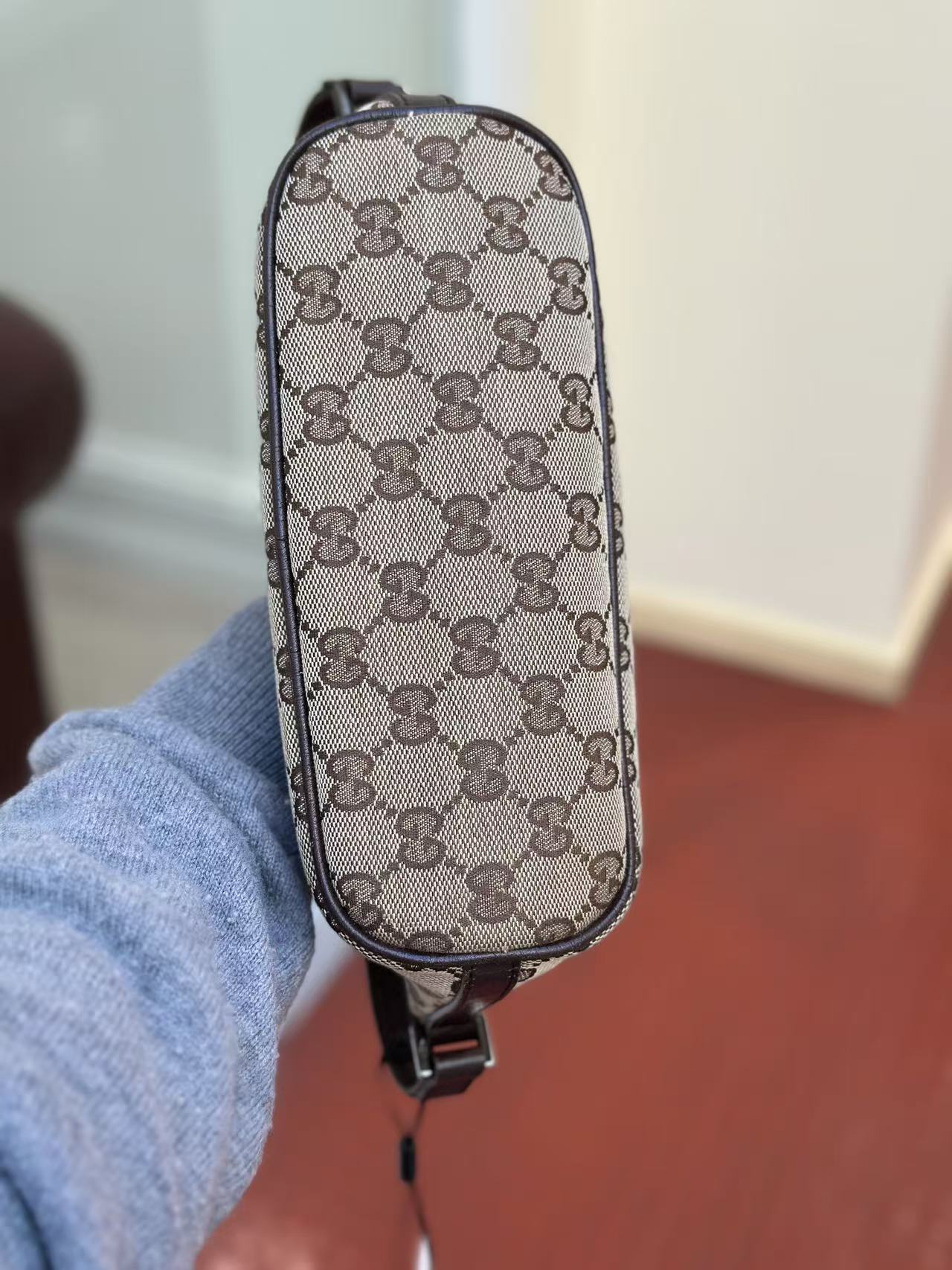 Pre-loved Gucci vintage GG Canvas Boat Baguette Bag