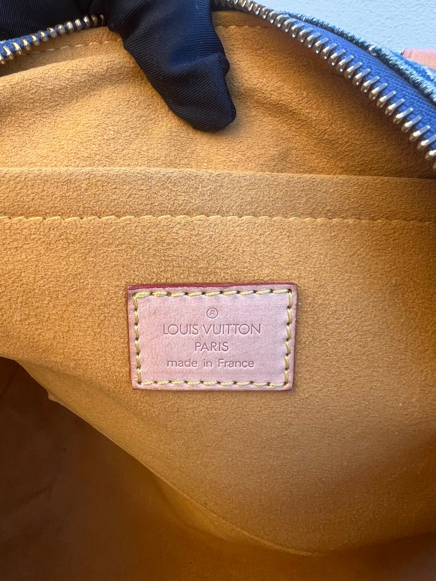 Pre-loved Louis Vuitton Blue Monogram Denim Neo Speedy Handbag 2005