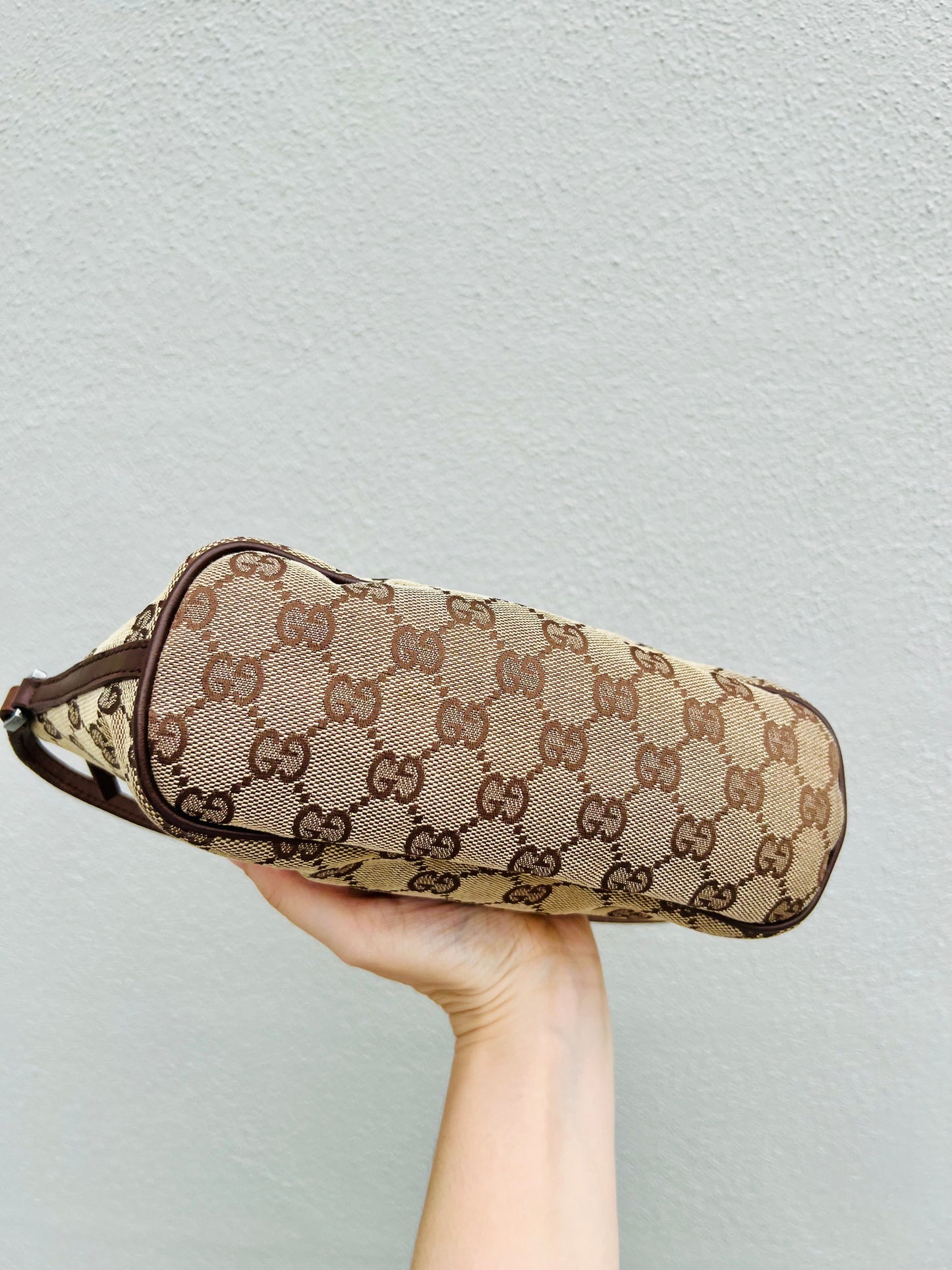 Pre-loved Gucci vintage GG Canvas Boat Baguette Bag Brown