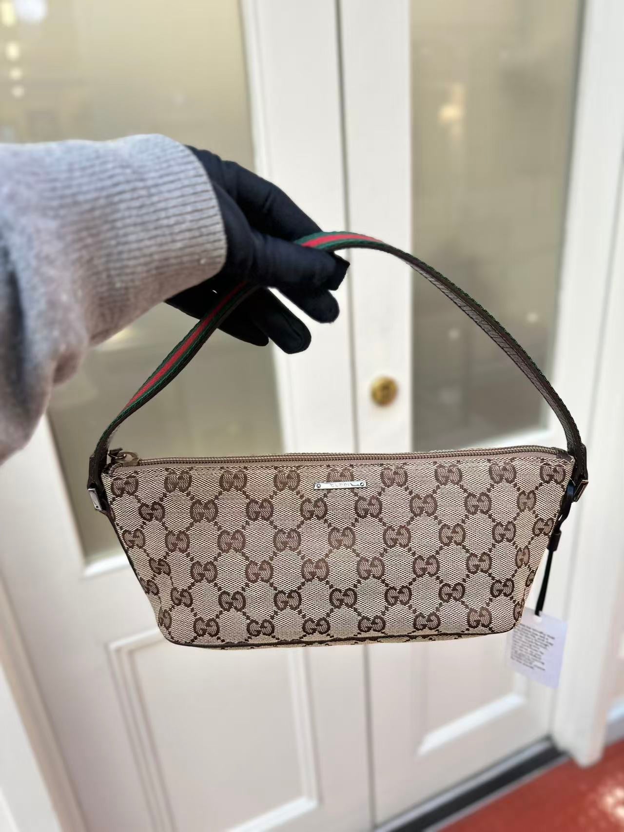 Pre-loved Gucci vintage GG Canvas Boat Baguette Bag