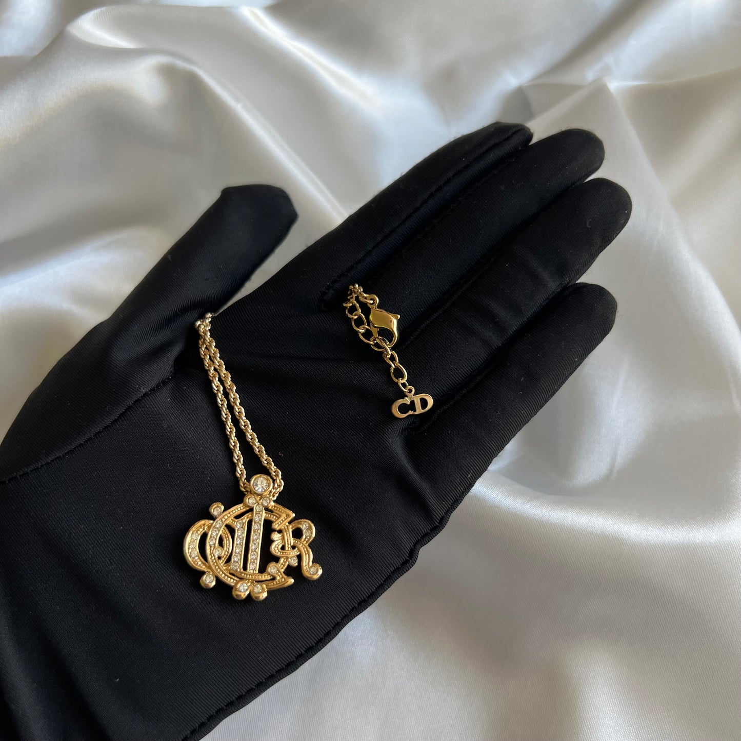 Pre-loved Christian Dior Emblem Logo Pendant Necklace Gold Plated Crystal Rhinestone