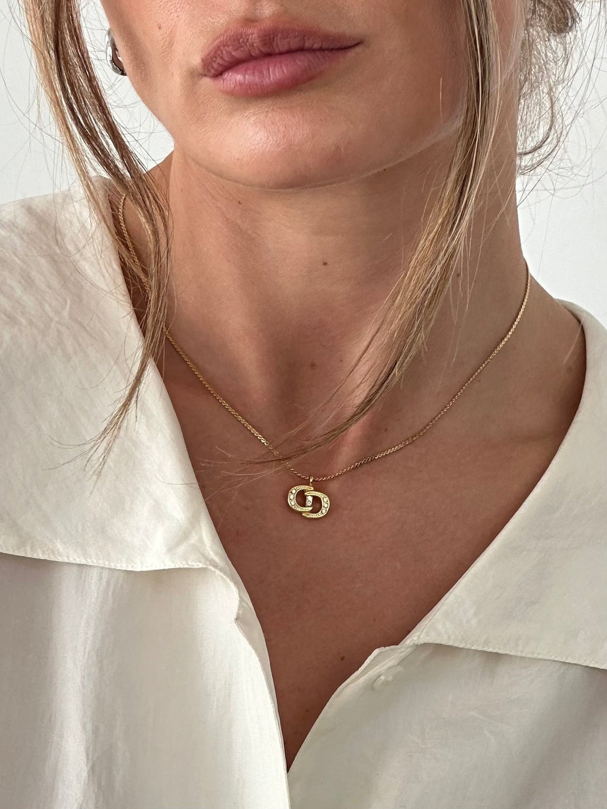 Pre-loved Christian Dior Vintage Gold Plated Rhinestone Logo Pendant Necklace