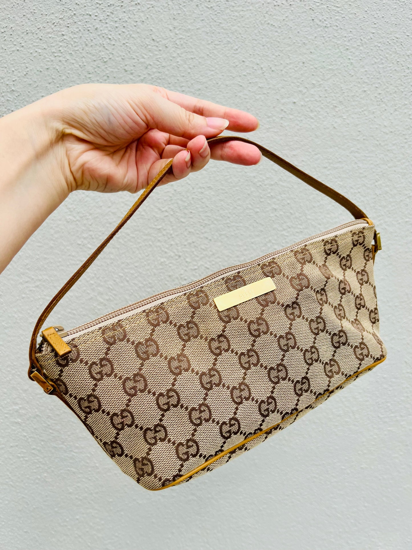 Pre-loved Gucci vintage GG Canvas Boat Baguette Bag