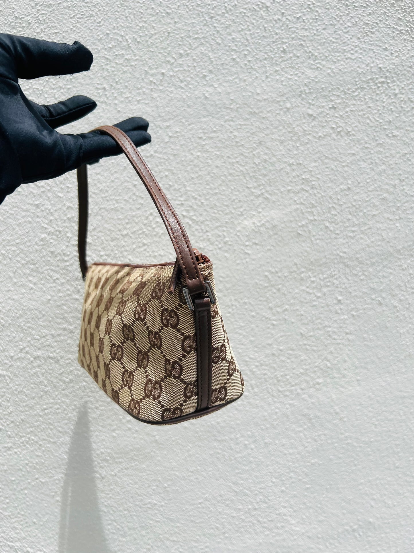 Pre-loved Gucci vintage GG Canvas Boat Baguette Bag Brown