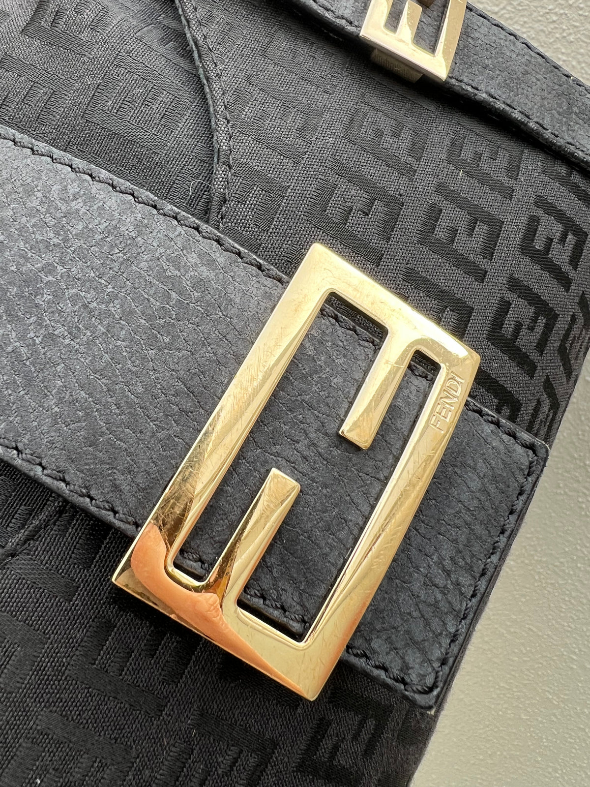 Pre-loved Mulitclasps Black Canvas and Leather Fendi Baguette Shoulder Bag