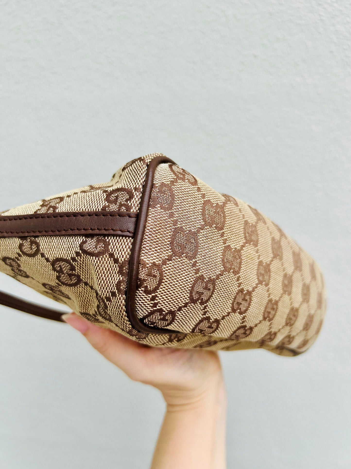 Pre-loved Gucci vintage GG Canvas Boat Baguette Bag Brown