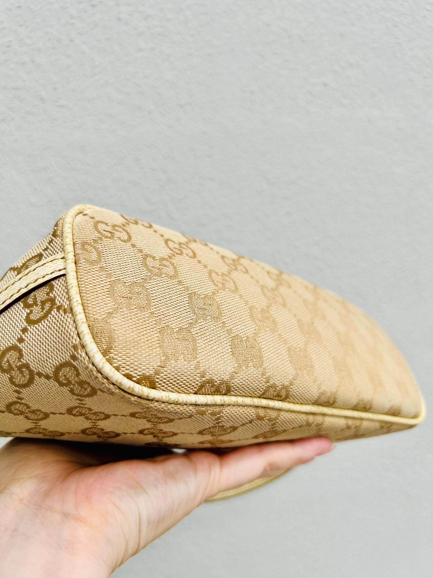 Pre-loved Gucci vintage GG Canvas Boat Baguette Bag Soft Lemon Sorbet Tone
