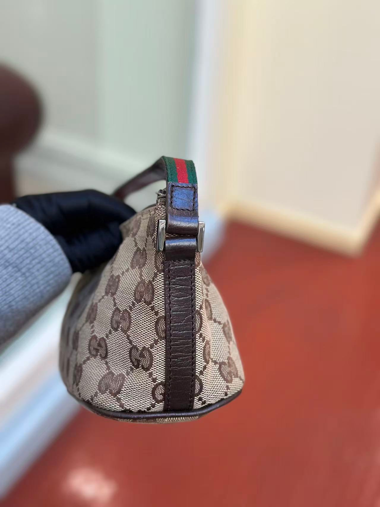 Pre-loved Gucci vintage GG Canvas Boat Baguette Bag