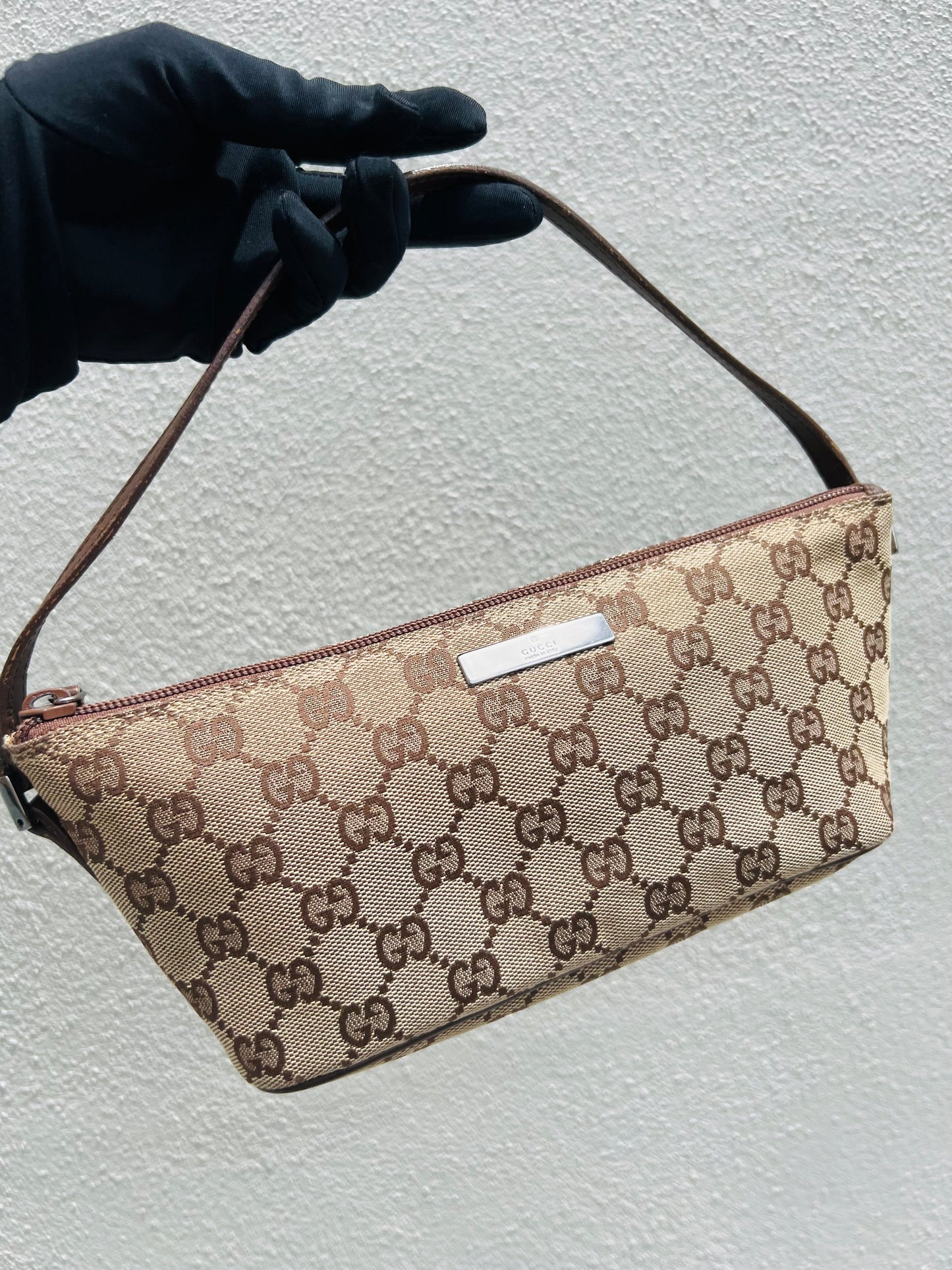 Pre-loved Gucci vintage GG Canvas Boat Baguette Bag Brown