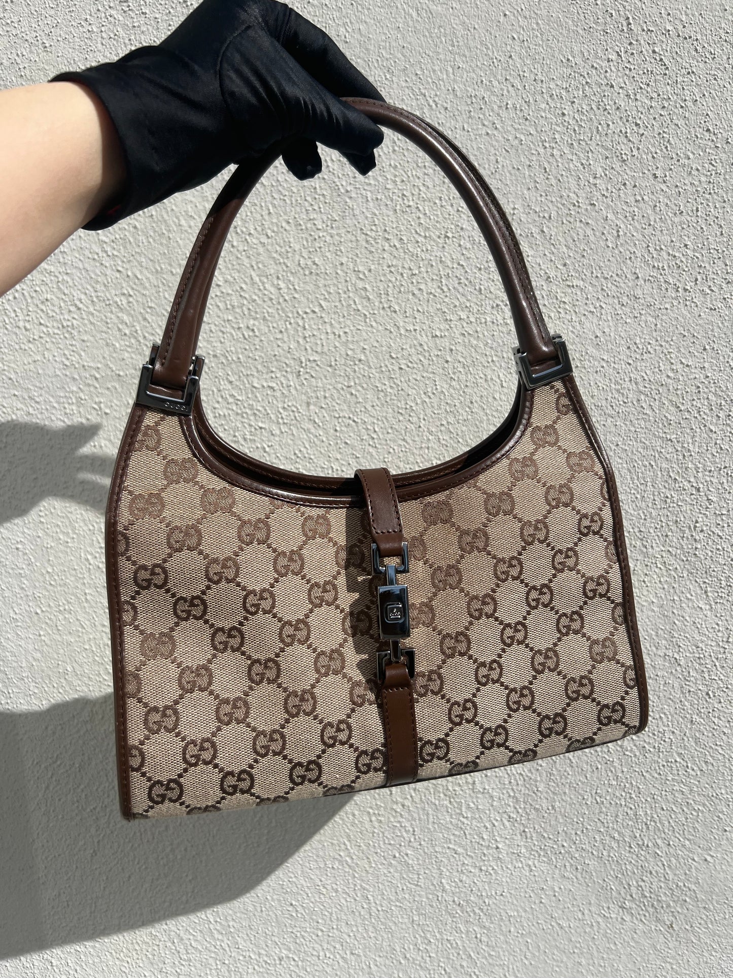 Pre-loved Gucci Jackie GG Canvas Handbag Brown