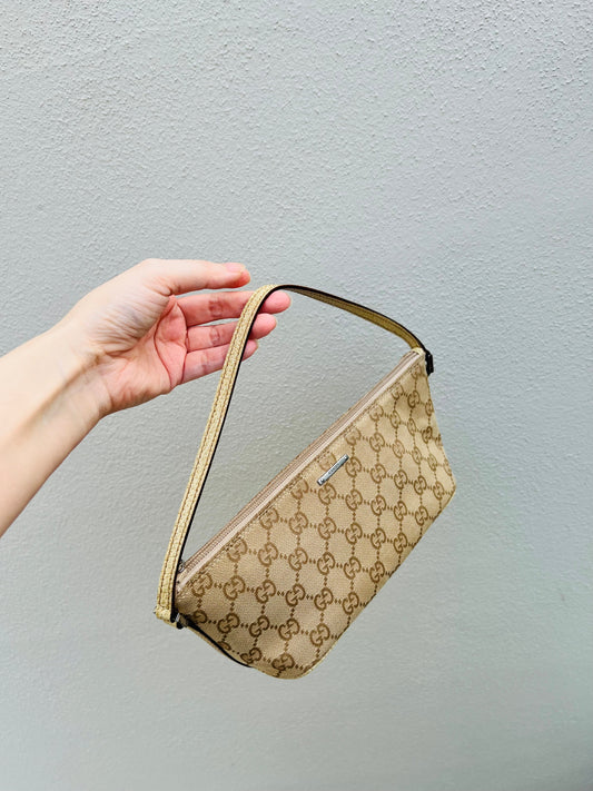 Pre-loved Gucci vintage GG Canvas Boat Baguette Bag Soft Lemon Sorbet Tone