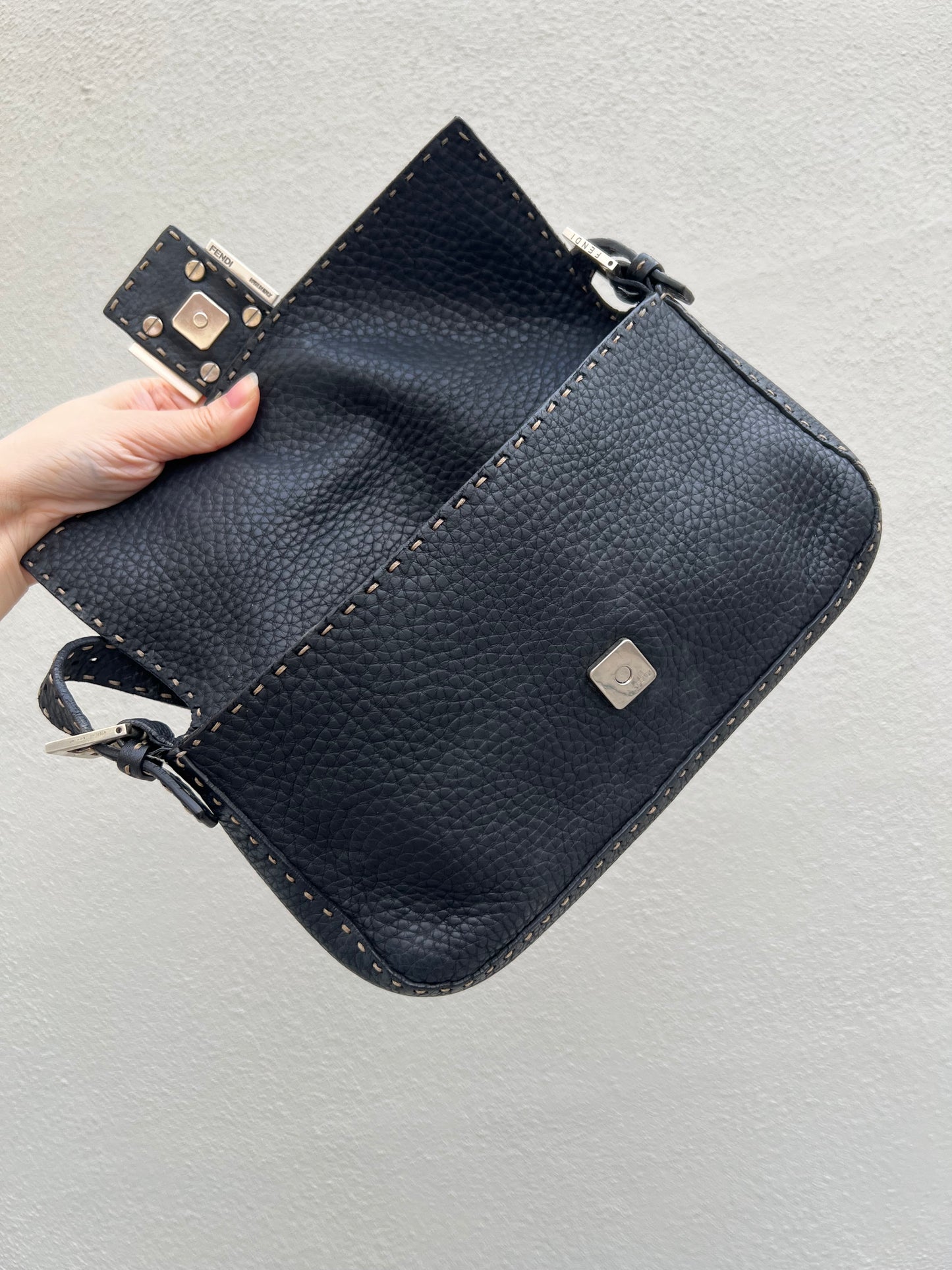 Pre-loved Fendi Baguette Black Cuoio Romano Leather Selleria with Sterling Silver Hardware