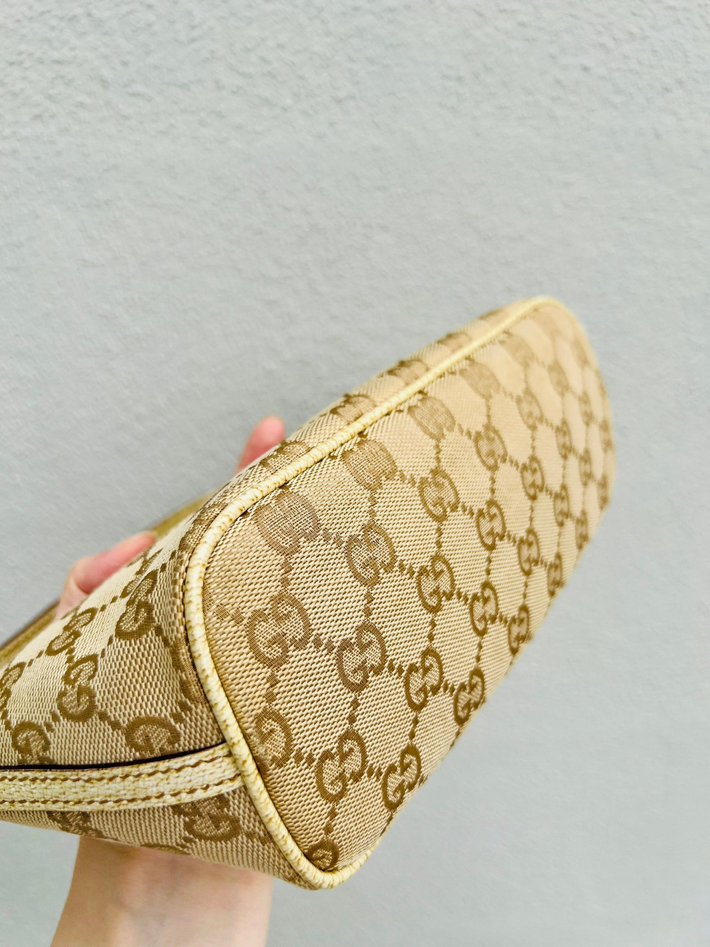 Pre-loved Gucci vintage GG Canvas Boat Baguette Bag Soft Lemon Sorbet Tone