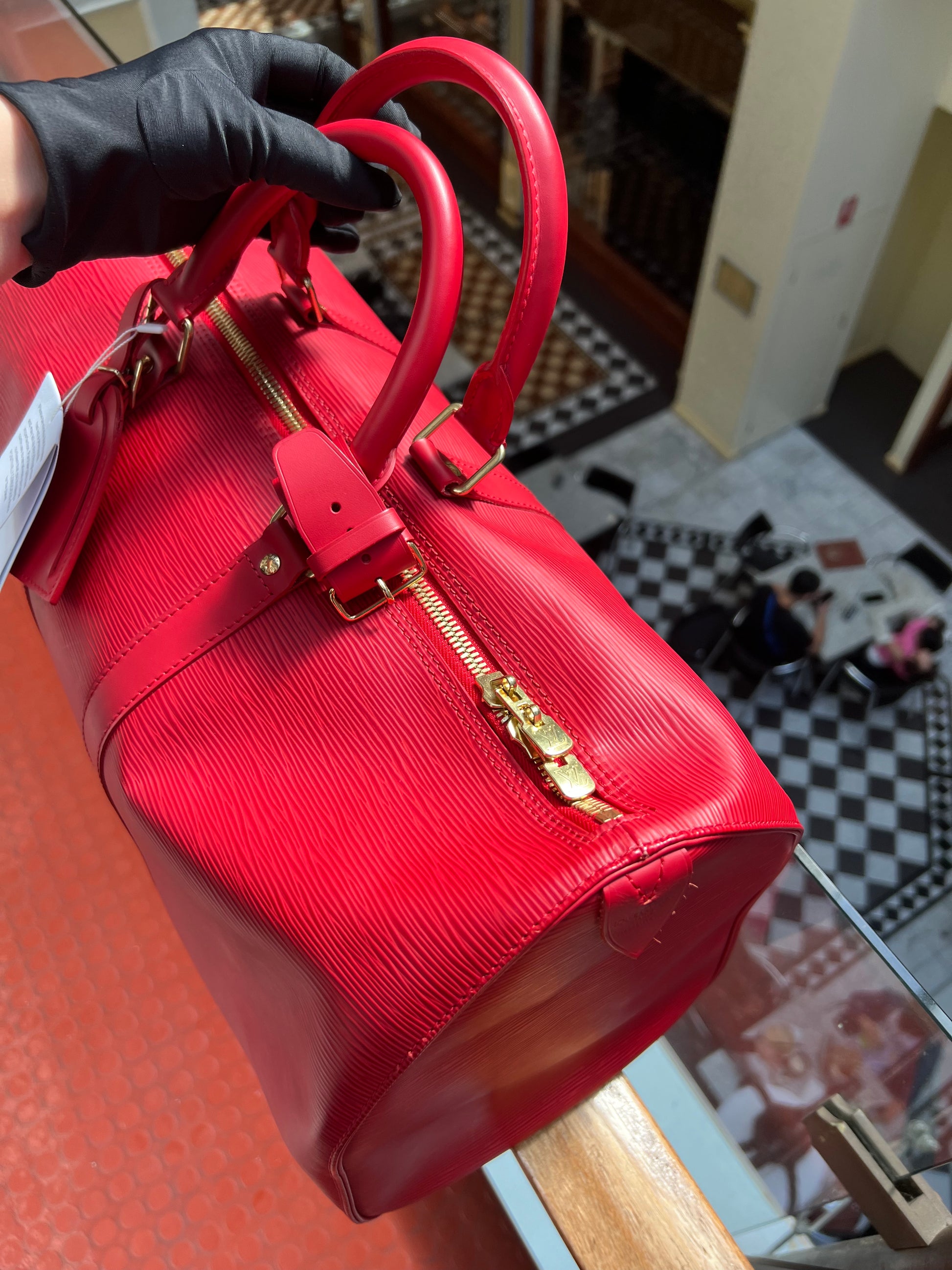 Keepall leather travel bag Louis Vuitton Red in Leather - 37281888
