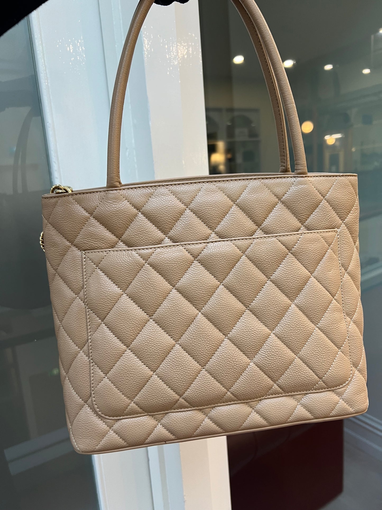 Pre-loved Chanel Caviar Medalion Tote Beige